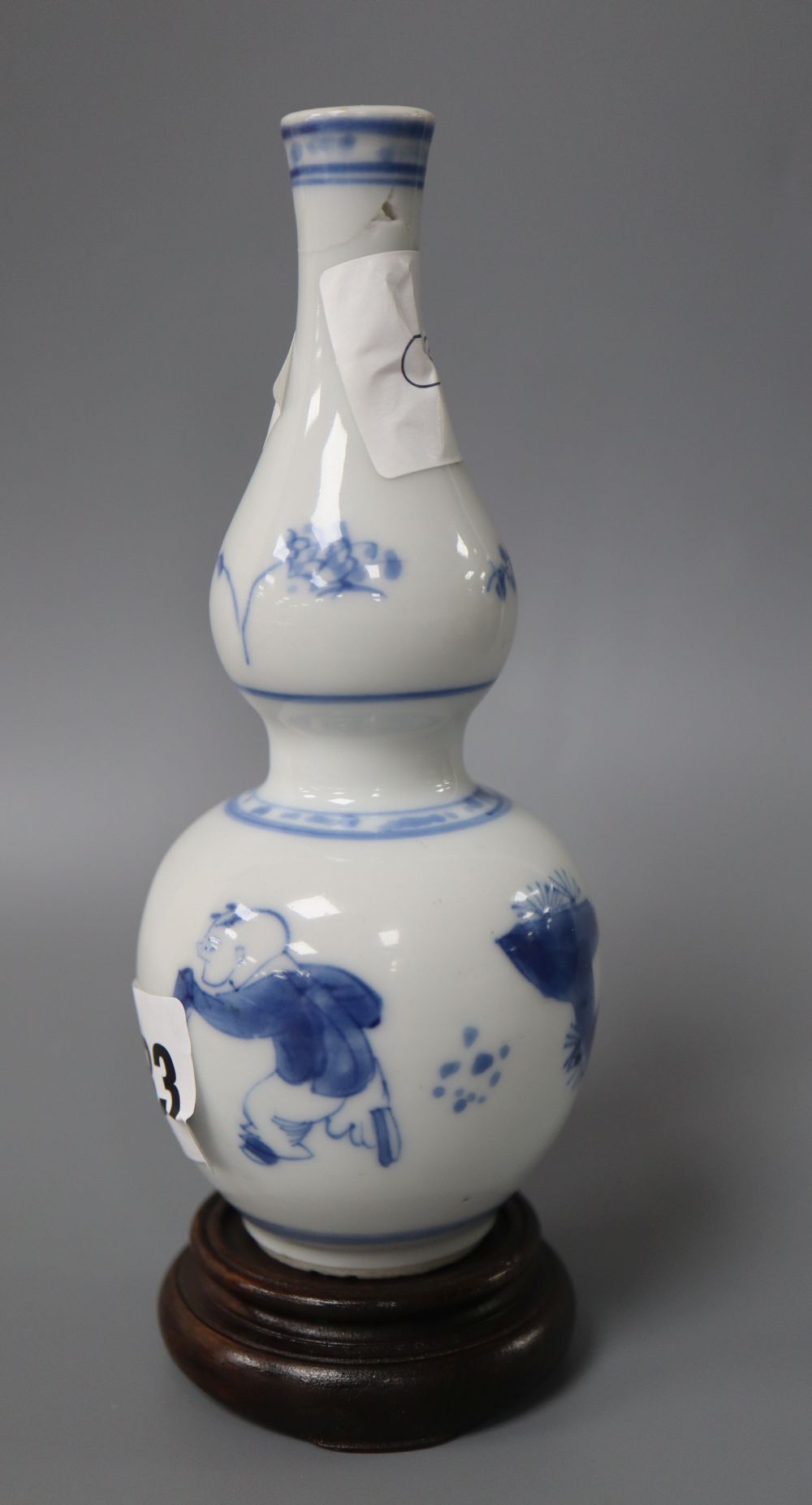 A Chinese miniature double gourd vase and stand, Kangxi, height 13.5cm